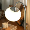 Crea un'atmosfera calda e allegra con la lampada GlowSphere