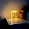 Luce notturna in resina con motivo floreale
