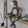 RoboShine Lampada Robot in Ferro – Illuminazione Gioiosa per Ogni Interno