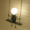 SwingDesign Lampada da parete – Lampada da parete moderna con figura oscillante giocosa