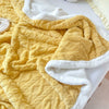 Coperta in pile reversibile – Comfort per ogni stagione