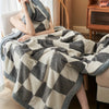 Coperta in pile di latte a quadri accogliente – Calore e stile in uno