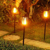 Torce da giardino ad energia solare efficienti – Illuminazione esterna suggestiva