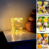 Luce notturna in resina con motivo floreale