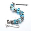Braccialetto charm con cristalli blu