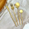 Set di posate dorate minimalista