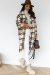 Giacca a quadri da donna – Elegante, calda e versatile