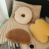 Cuscini in peluche geometrici per il divano
