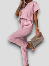 Zwarte Dames Jumpsuit Kort met V-hals en Verstelbare Taille – Feestelijke en Comfortabele Stijl - Lichtroze