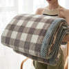 Coperta in pile di latte a quadri accogliente – Calore e stile in uno